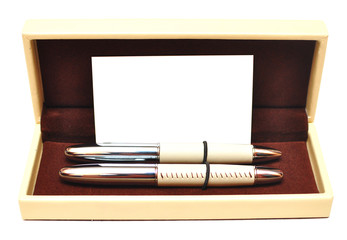 two gift pens in a case with the form for the text