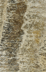 Surface of the travertine. Tints of brown and grey. Striped.