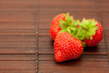 Strawberries on a bamboo mat