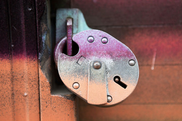 Old rusted garage padlock