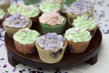 Full plate of just baked whole grain home made muffins