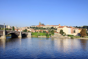 View on summer Prague above River Vltava with  gothic Castle