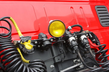 Element of red agricultural tractor