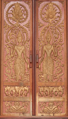 Fototapeta na wymiar Traditional Laos Style Temple Door Art