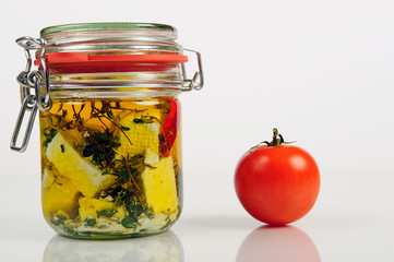 cheese in olive oil with tomato
