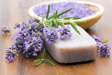 bar of natural soap, herbs and bath salt