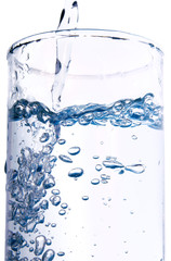 Pure water is poured in a glass