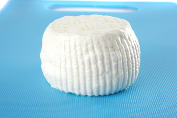 Obraz na płótnie Canvas white cheese on plate