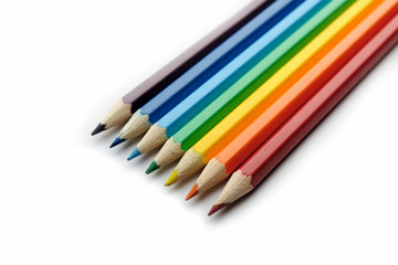 Fototapeta premium Colored pencils arranged in rainbow spectrum order
