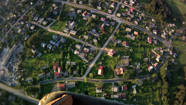 view from a balloon basket on village