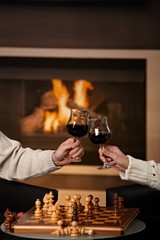 Hands holding glas of wine