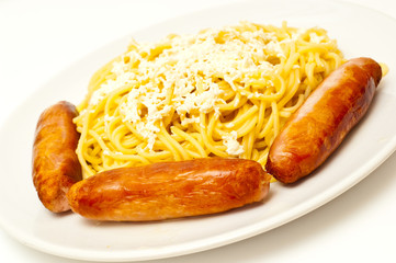spaghetti with cheese and sausages isolated