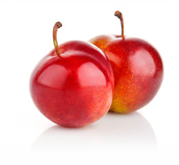 fresh plum fruits isolated on white