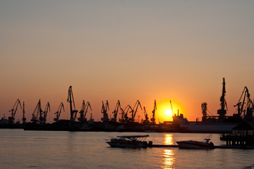 Naklejka premium seaport with the tower cranes