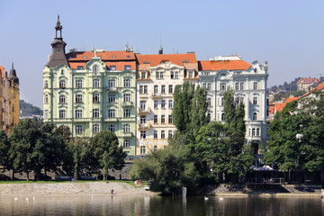 Fototapeta na wymiar The View on summer Prague Building above River Vltava