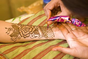 applying henna on hand, bride , traditional Hindu wedding , Rajasthan, India	