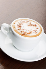 cup of coffee with cinnamon