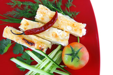 cannelloni served with pepper and tomato