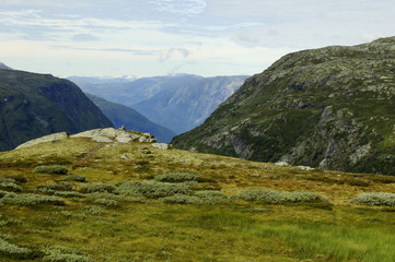 Fototapeta na wymiar Jotunheim mountains with clouds on sky, Norway