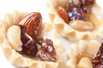 Desserts background with nuts isolated.