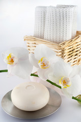 Soap with orchid and towels