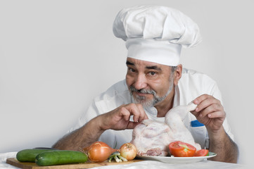 smiling chef with vegetables