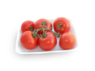 Tomatoes on a branch.
