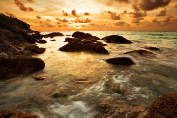 Fototapeta premium Tropical sunset at the rocks. Thailand