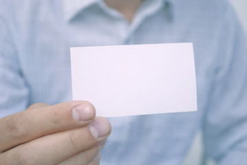 Blank card in hand