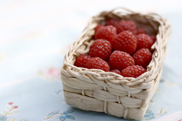 raspberries on a table
