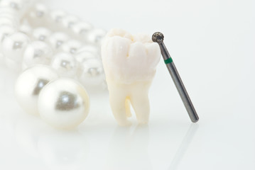 Real human wisdom tooth natural pearls anв dental drill