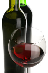 Bottles and glass of red wine