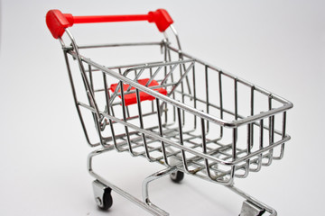 isolated shopping cart on the white