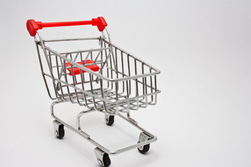 isolated shopping cart on the white