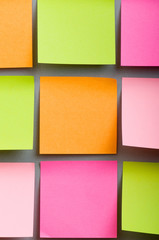 Reminder notes on the bright colorful paper