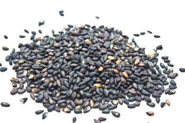 Black sesame seeds isolated on white background