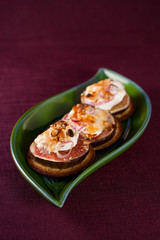 figs and cheese on cracker