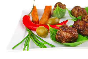 grilled cutlets on basil leafs