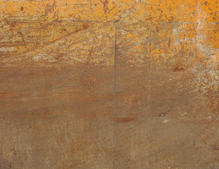orange painted metal with rust and scratches