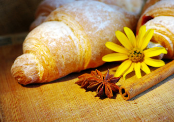 Some croissants on the wood texture