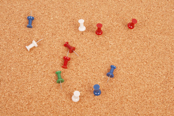 A cork Notice board with pins