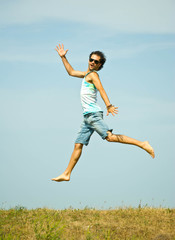 Man jumping on sky background