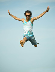 Man jumping on sky background