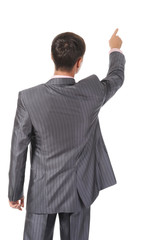 Businessman points finger up