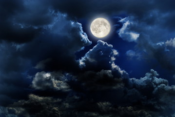 Fototapeta premium full moon over dark sky with.