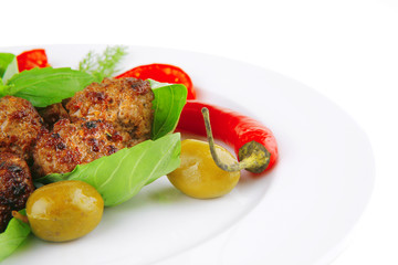 meat balls on basil leaf