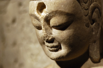 Fototapeta na wymiar Face of stone Buddha in china