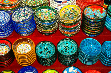 Fototapeta na wymiar Hand decorated plates on the shelves of the grand bazaar