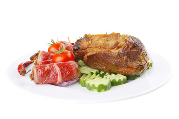 served meat chunk with rolls  on white