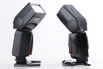 Two camera flash against each other 